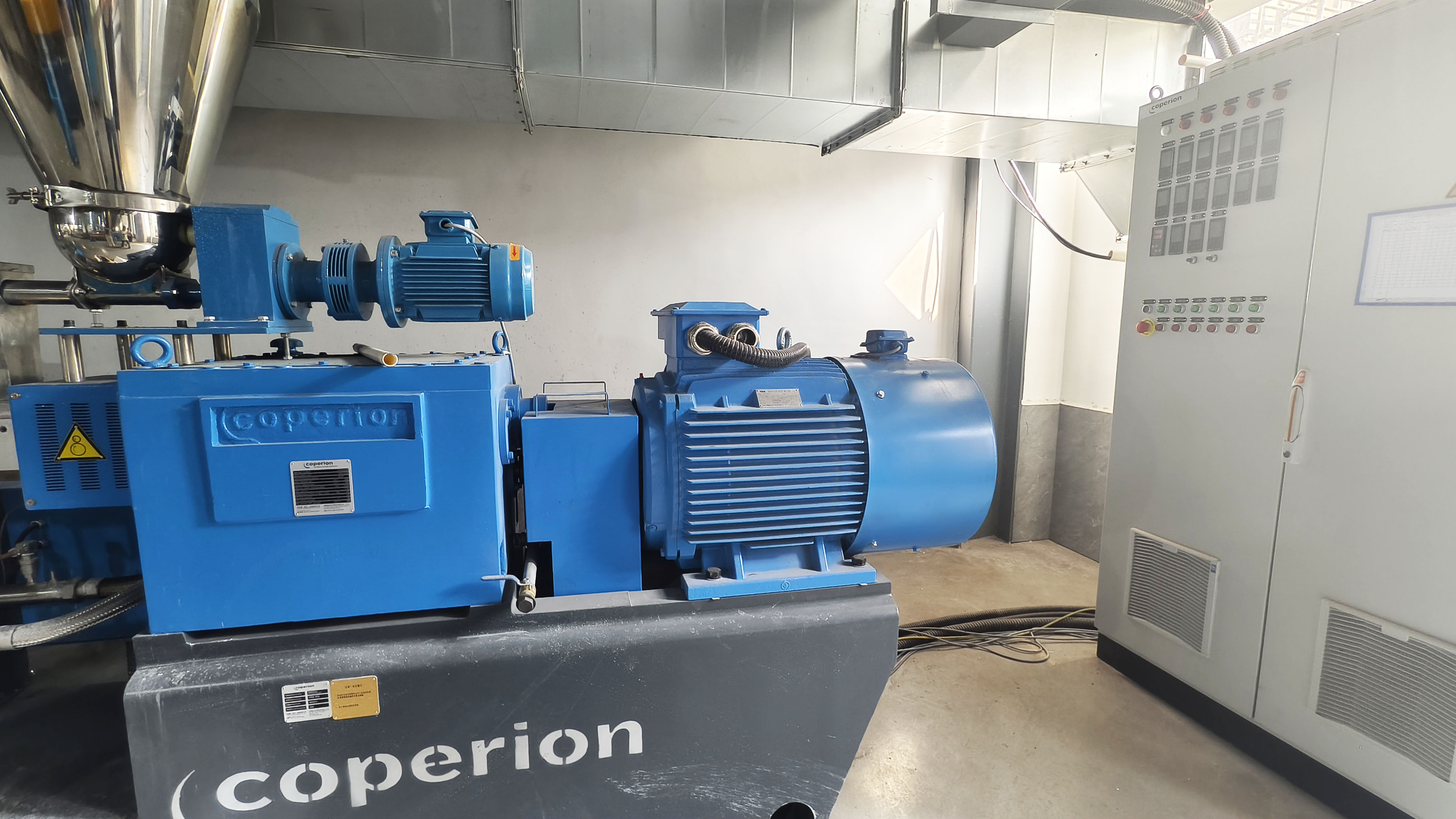 Coperion twin-screw extruders and control cabinets